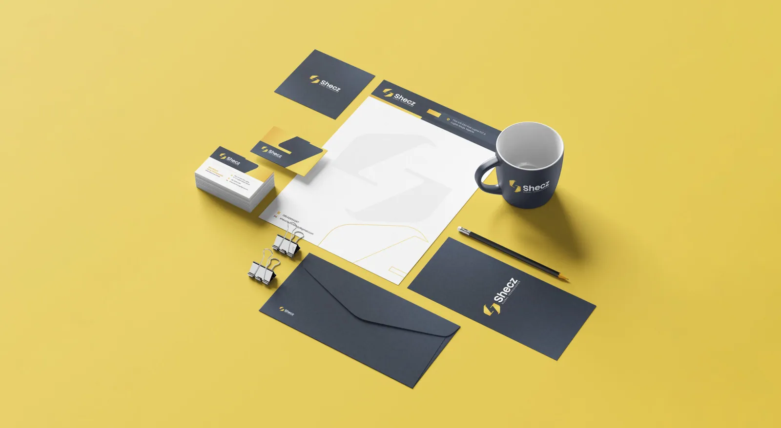 Corporate business card mockups in a luxurious black and gold setup.